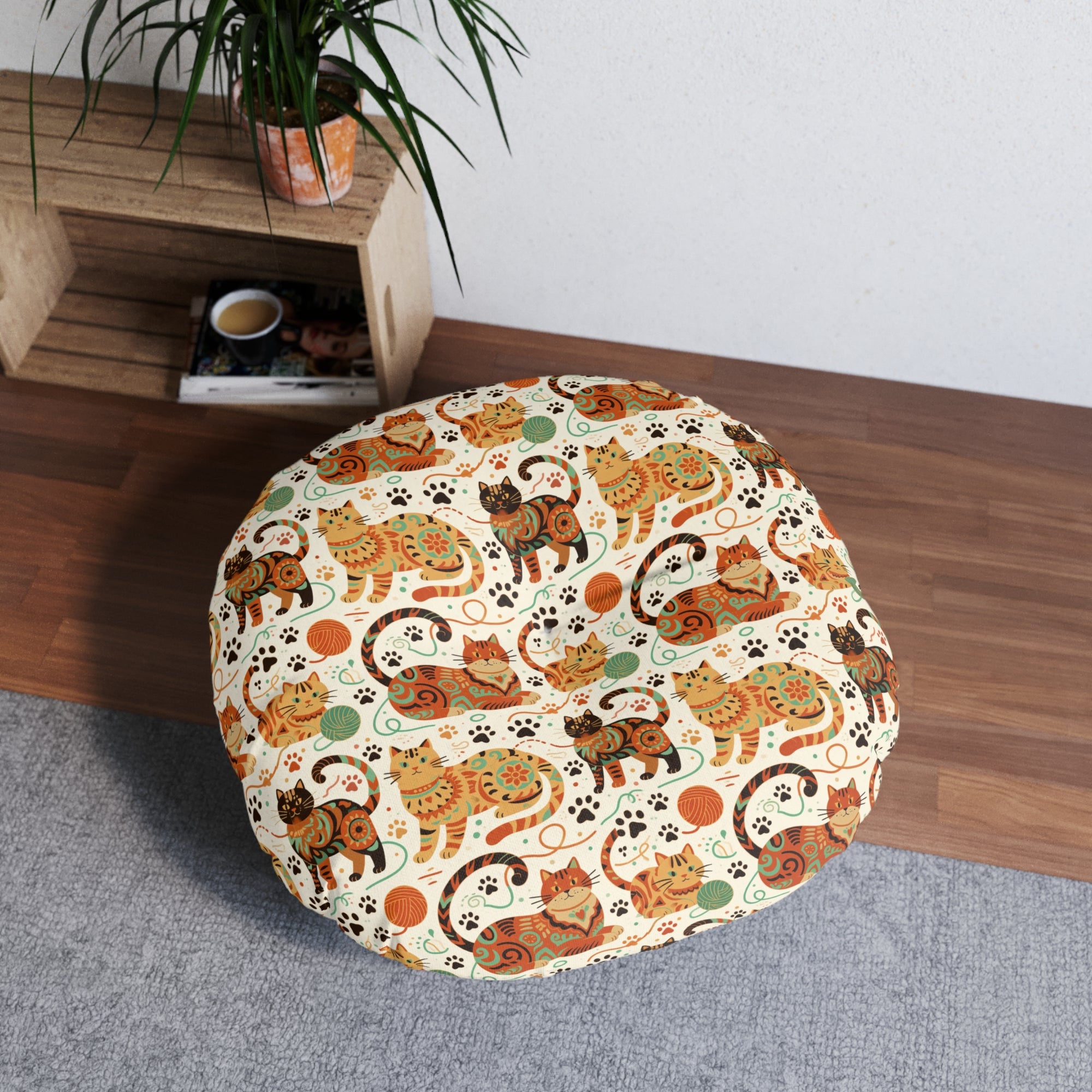 Indoor Round Floor Pillow - Colorful folk art patterned cats, vibrant orange and teal hues, playful felines with yarn and paw prints, bohemian animal illustration, cream background, artistic and cheerful design
