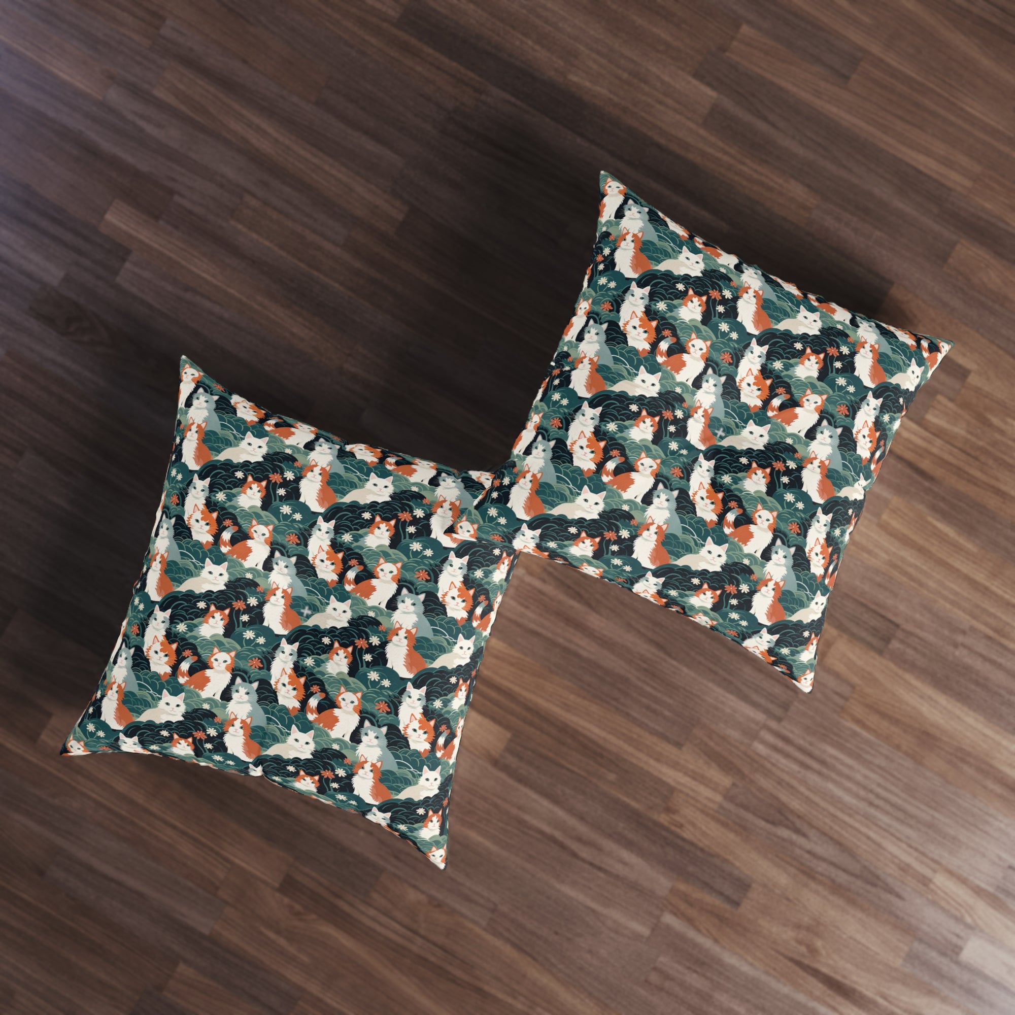 Indoor Square Floor Pillow - A whimsical, fluffy, watercolor depiction of various cats of different colors peeking out from a dense dark blue and green bush with white flowers.