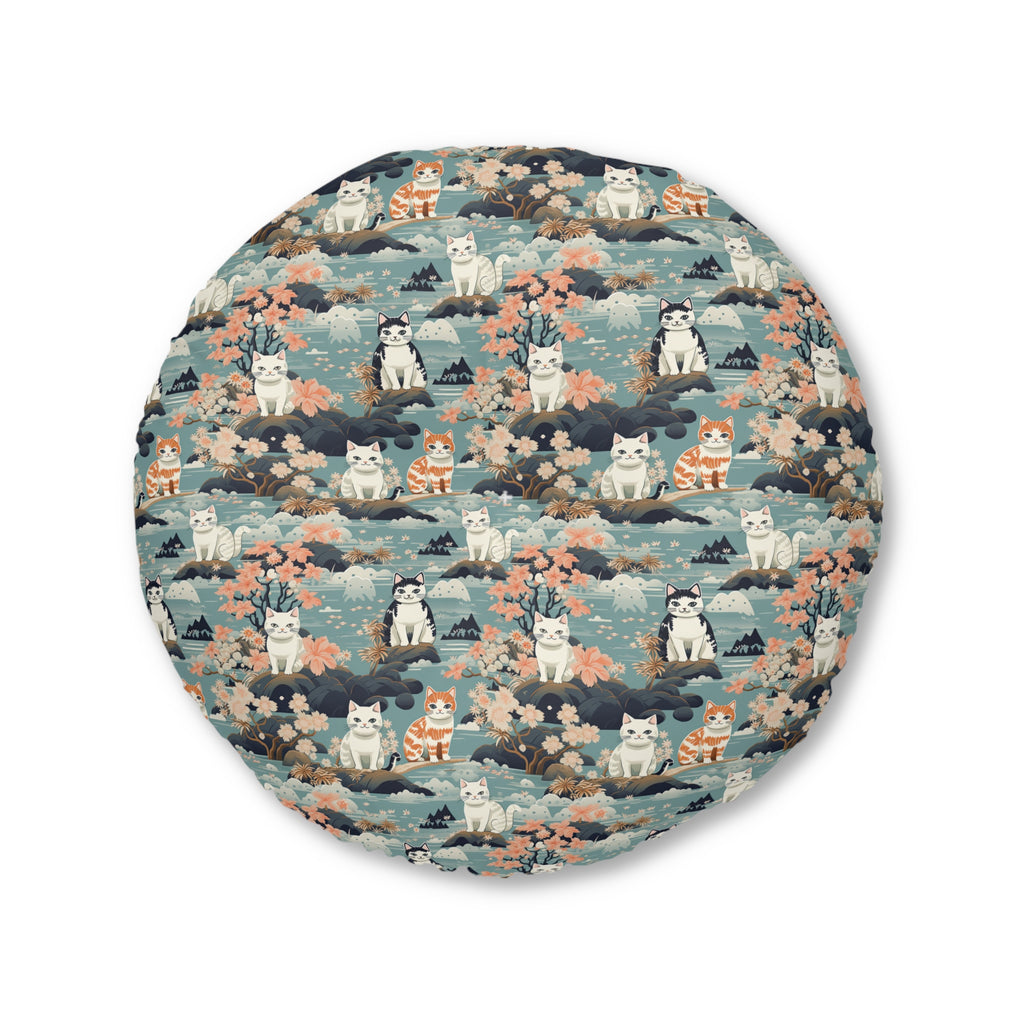 Indoor Round Floor Pillow - A serene watercolor painting of fluffy cats lounging on rocks, surrounded by cherry blossoms and blue water, in a tranquil, nature-filled, Japanese-inspired landscape.