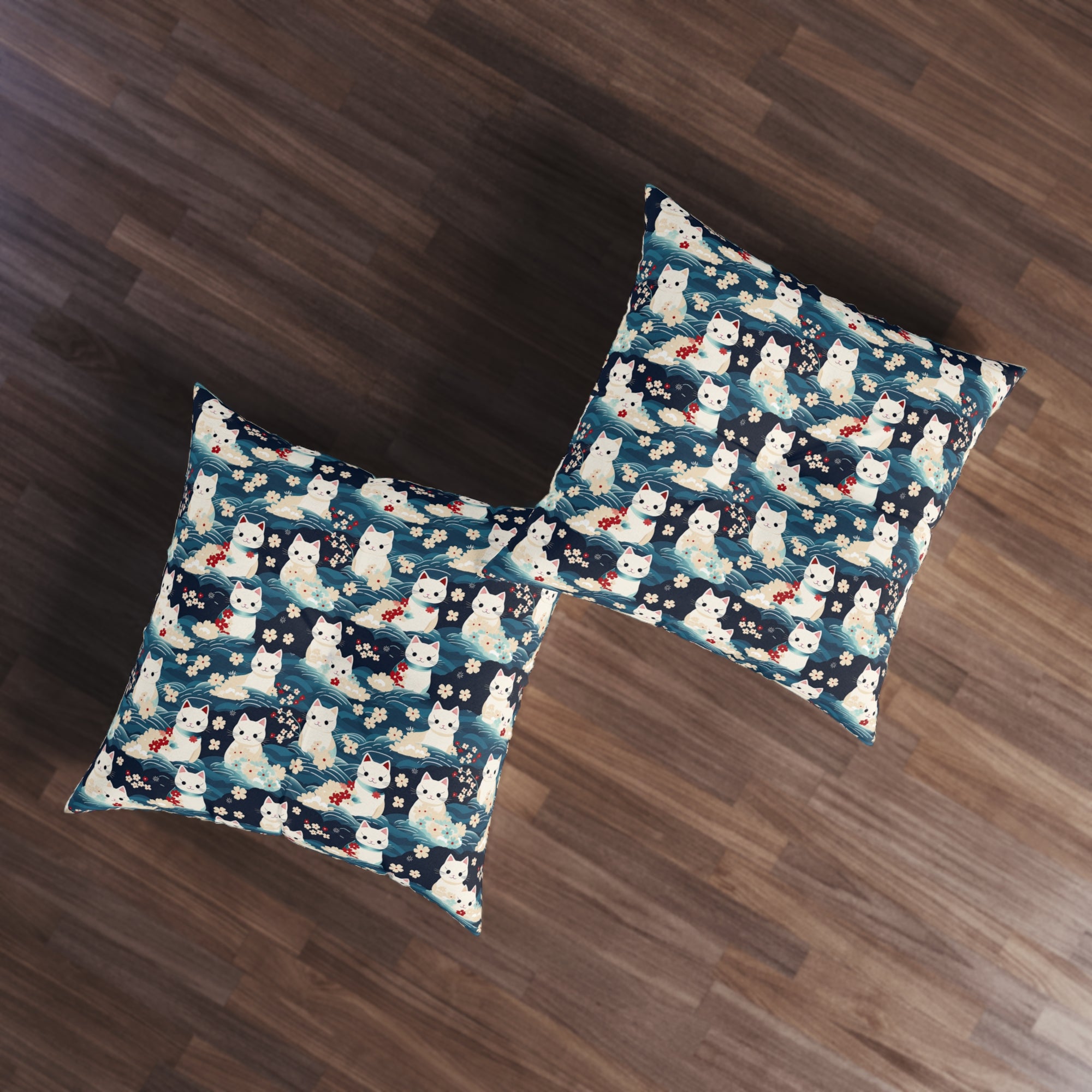 Indoor Square Floor Pillow - A lovely, playful, Japanese-inspired illustration of sweet white cats sitting on rolling blue waves with red and white flowers and gentle clouds.