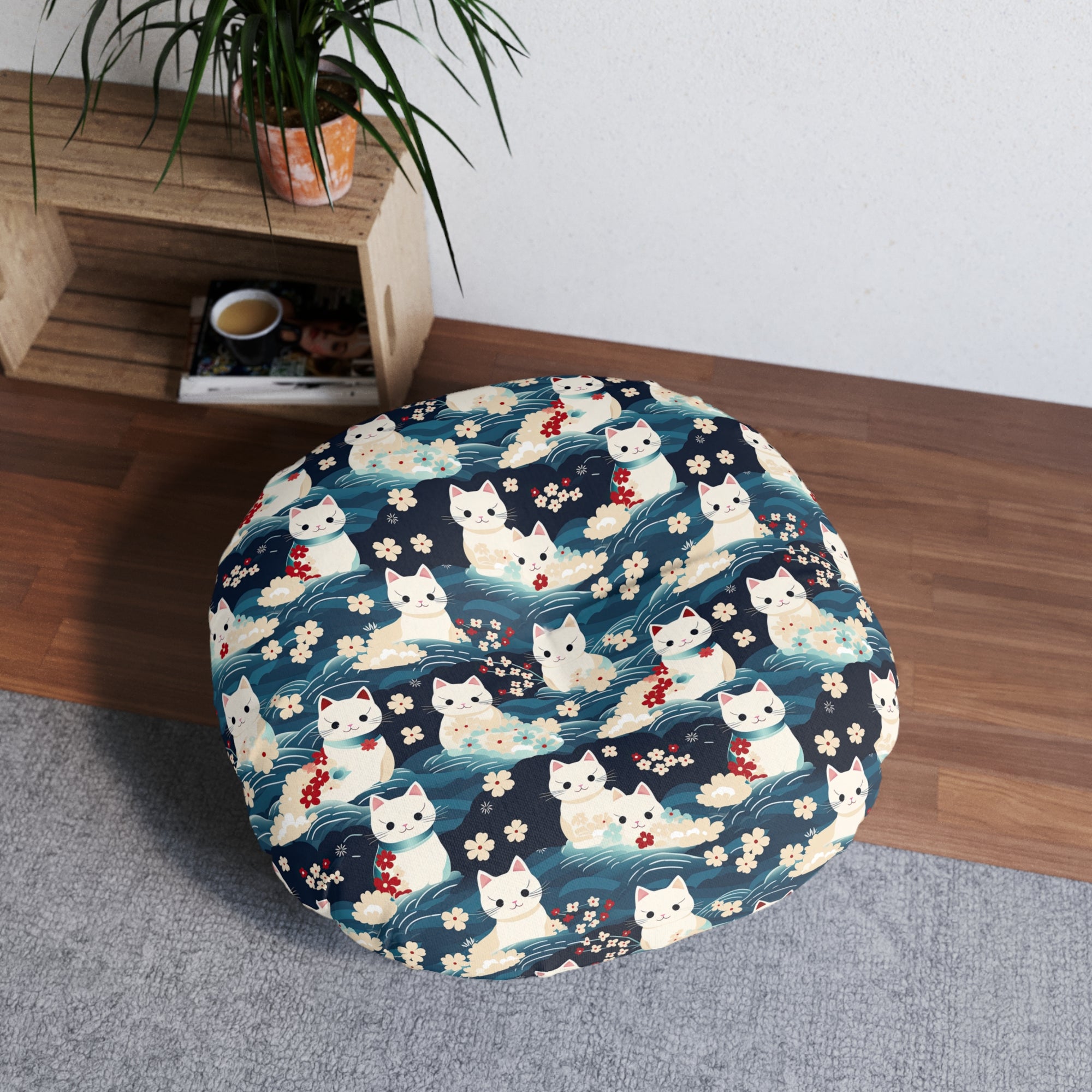 Indoor Round Floor Pillow - A lovely, playful, Japanese-inspired illustration of sweet white cats sitting on rolling blue waves with red and white flowers and gentle clouds.