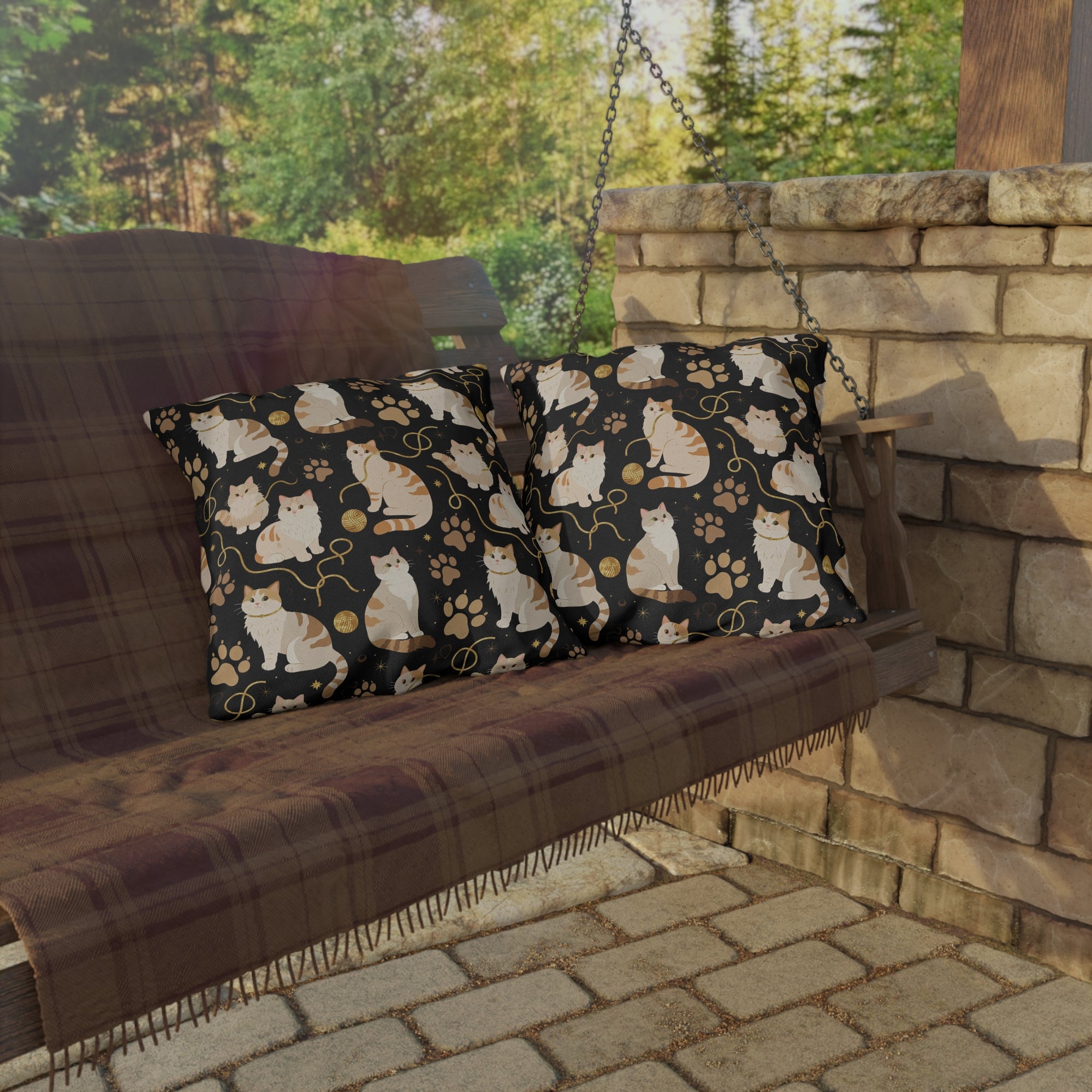 Outdoor Pillow - Elegant felines and sparkling gold yarn on black, adorable cats with golden paw prints, sophisticated pet motif, charming animal pattern, cozy and warm artistic illustration