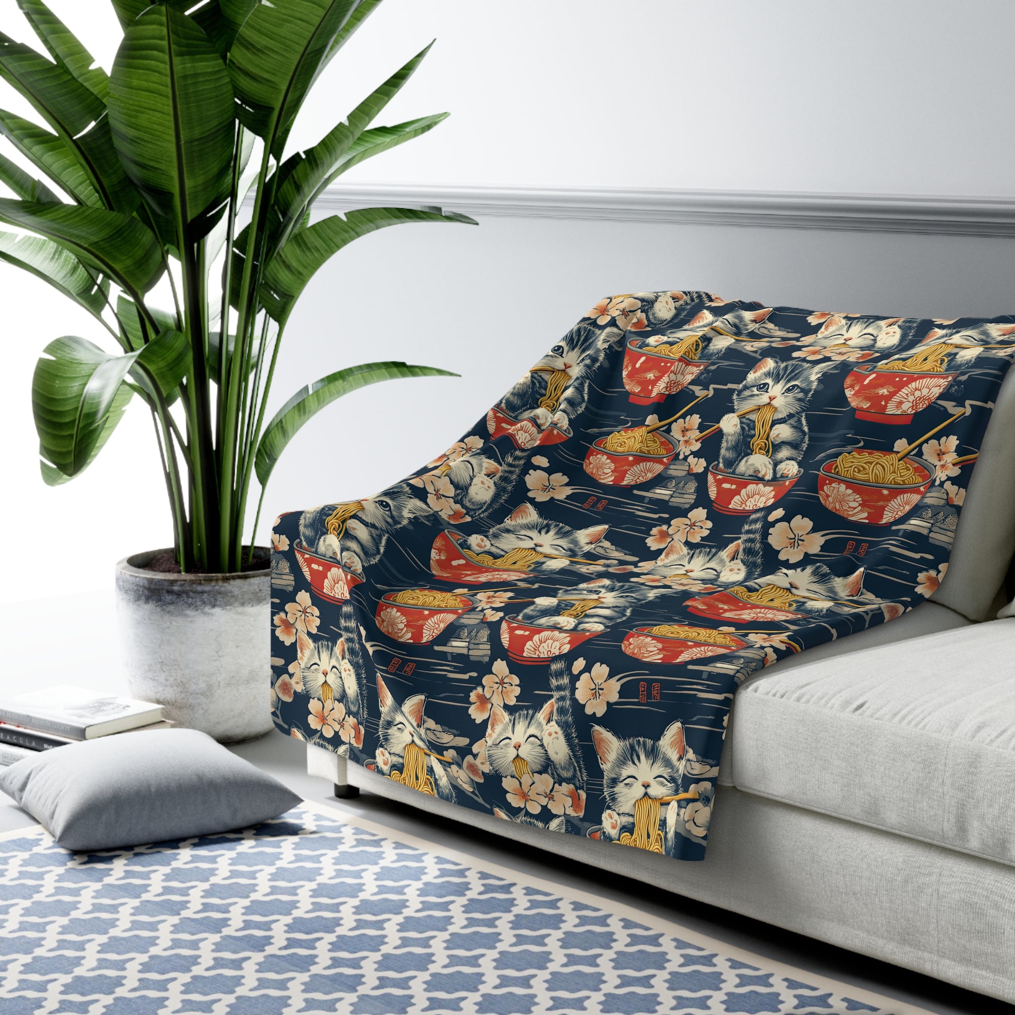Sherpa Blanket - A charming and detailed illustration of happy kittens in red ramen bowls eating their noodles with chopsticks among beautiful pink cherry blossoms on a dark background.
