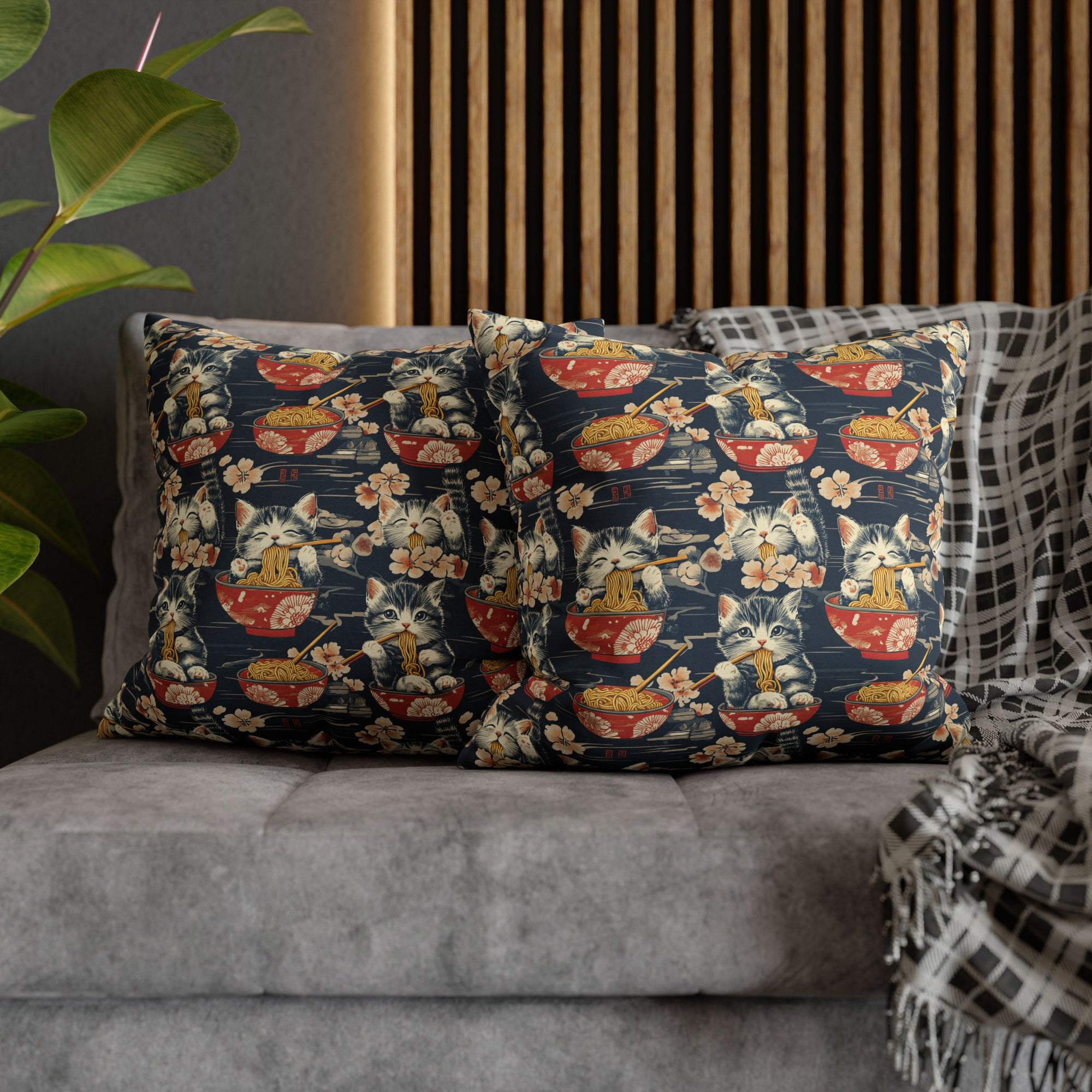 Square Pillowcase - A charming and detailed illustration of happy kittens in red ramen bowls eating their noodles with chopsticks among beautiful pink cherry blossoms on a dark background.