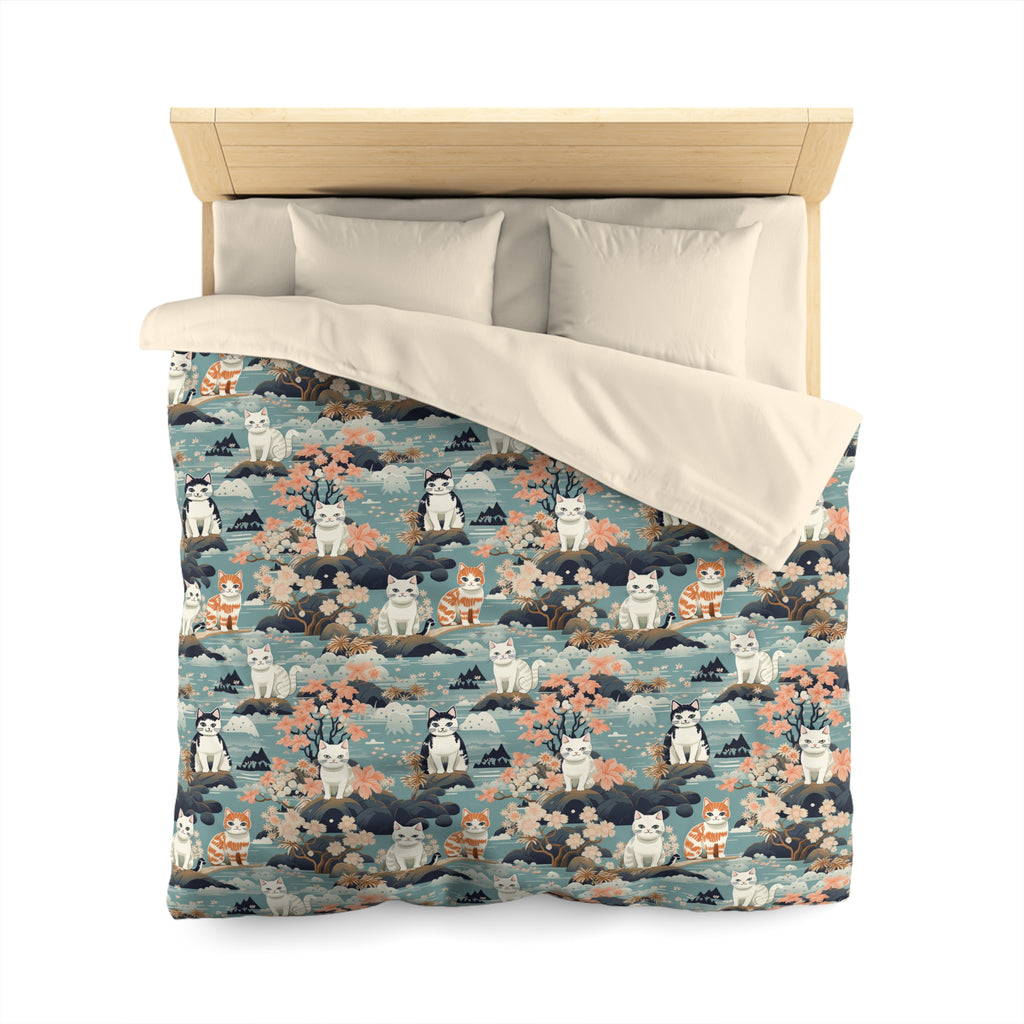 Duvet Cover - A serene watercolor painting of fluffy cats lounging on rocks, surrounded by cherry blossoms and blue water, in a tranquil, nature-filled, Japanese-inspired landscape.