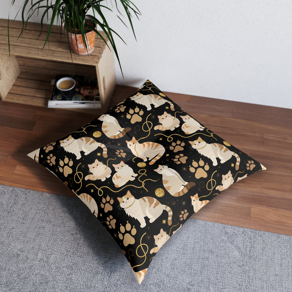 Indoor Square Floor Pillow - Elegant felines and sparkling gold yarn on black, adorable cats with golden paw prints, sophisticated pet motif, charming animal pattern, cozy and warm artistic illustration