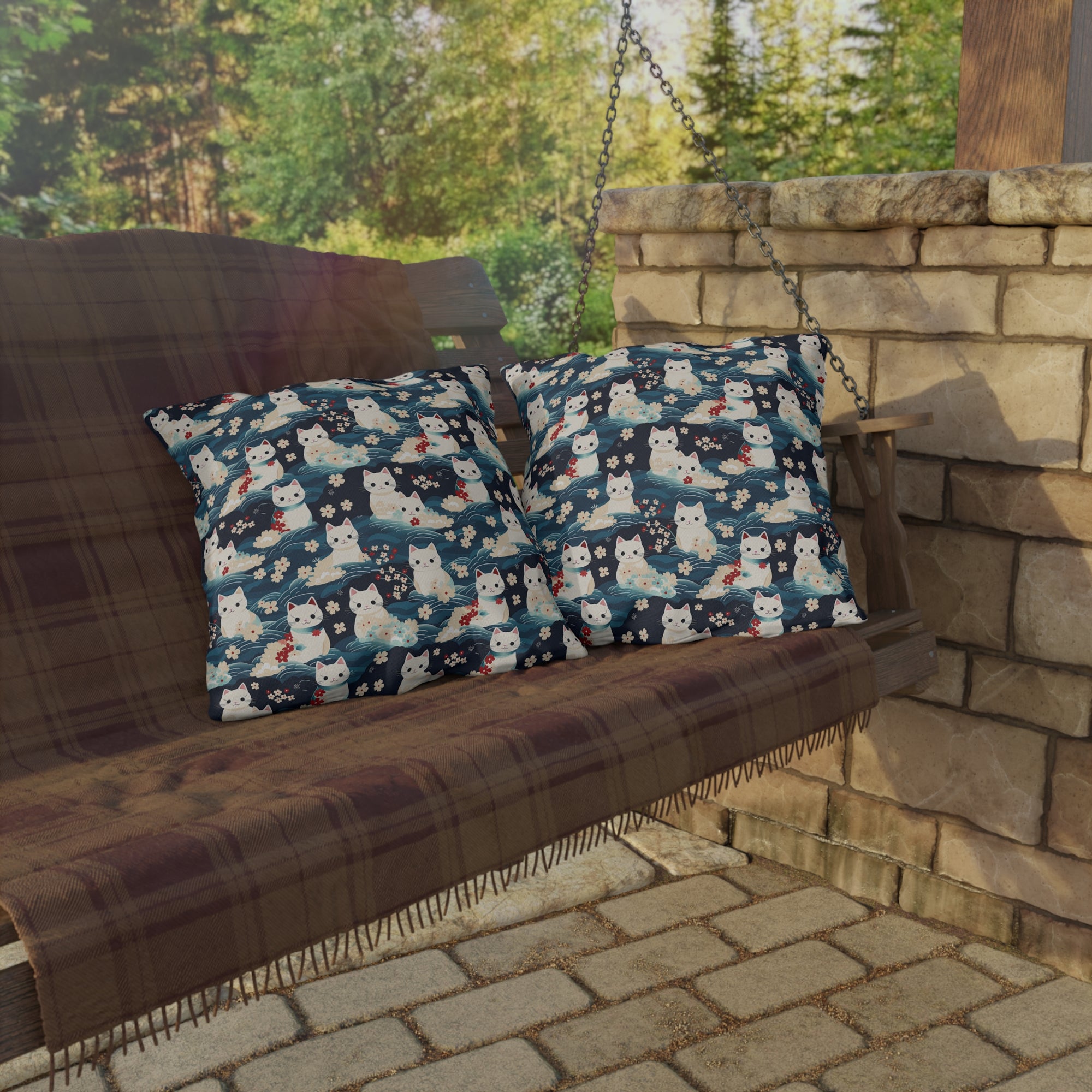 Outdoor Pillow - A lovely, playful, Japanese-inspired illustration of sweet white cats sitting on rolling blue waves with red and white flowers and gentle clouds.