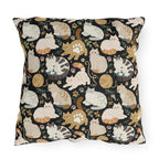 Outdoor Pillow - Diverse cats and kittens in a dark garden, various breeds and colors, soft natural tones with foliage and paw prints, charming animal illustration, dark background, gentle pet themed art
