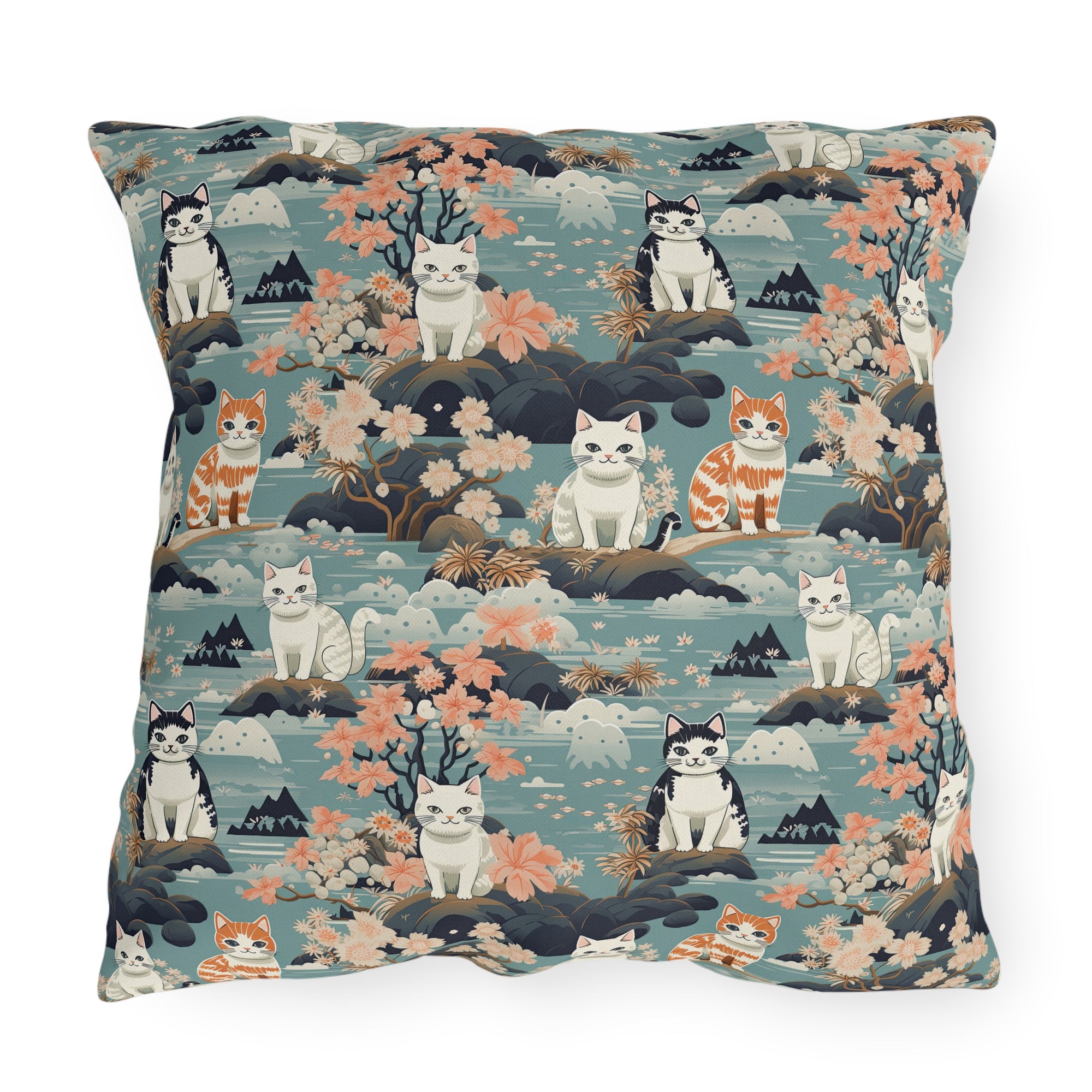 Outdoor Pillow - A serene watercolor painting of fluffy cats lounging on rocks, surrounded by cherry blossoms and blue water, in a tranquil, nature-filled, Japanese-inspired landscape.