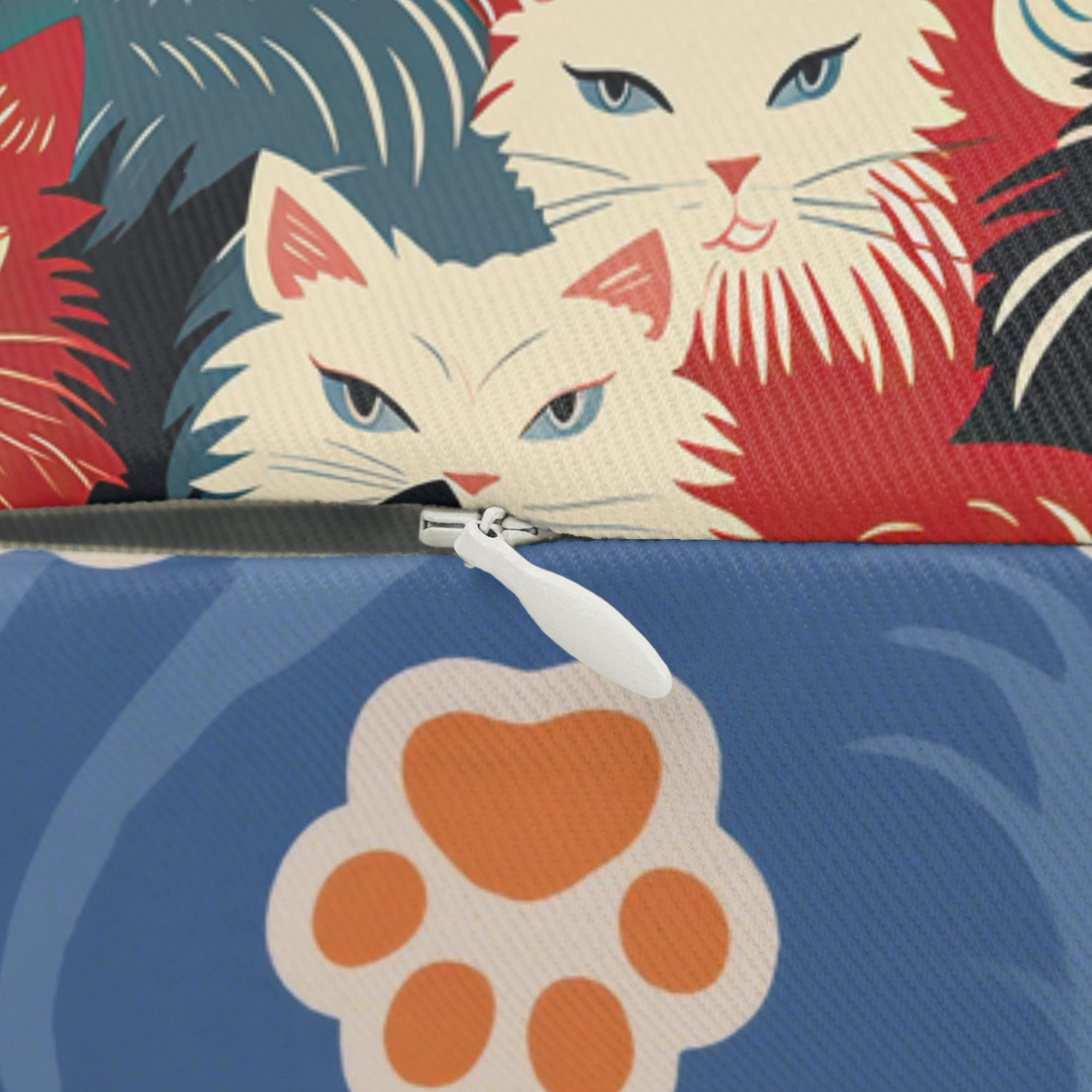Indoor Lumbar Pillow - A bold and graphic pop art style illustration featuring a tight-knit cluster of various fluffy felines in black, white, red, and blue.