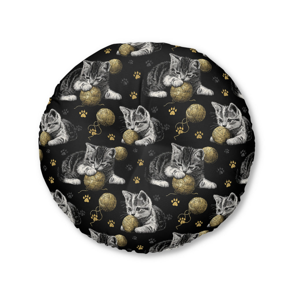 Indoor Round Floor Pillow - Grey and White Kittens Playing with Golden Yarn on a Black Background with Paw Prints