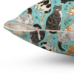 Indoor Square Pillow - A Delightful Assortment of Charming Cats in Diverse Poses and Breeds Scattered Across a Soft Blue Floral Background