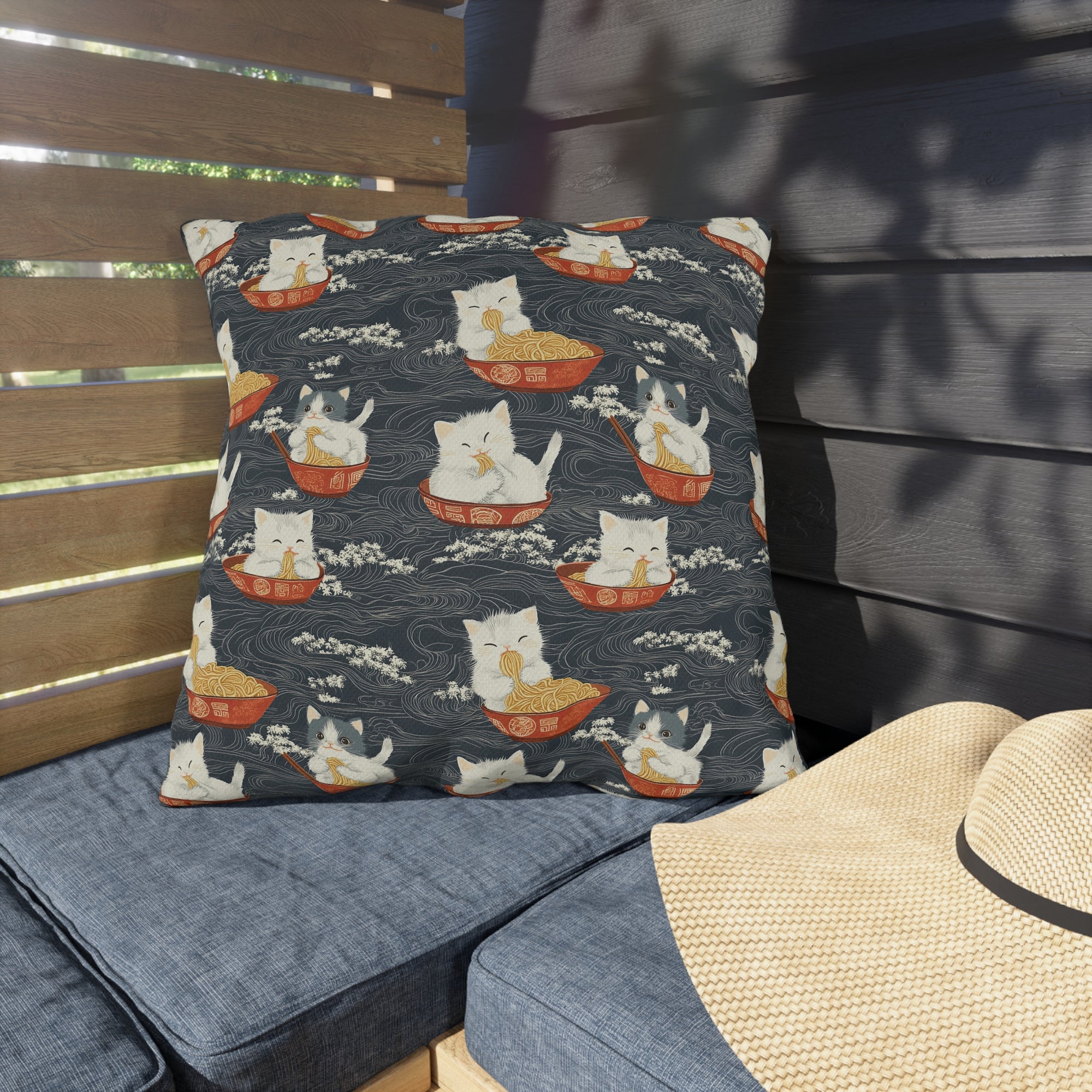Outdoor Pillow - An adorable and cute pattern of baby cats happily eating steaming ramen noodles from traditional red and white bowls with beautiful white floral elements surrounding them.