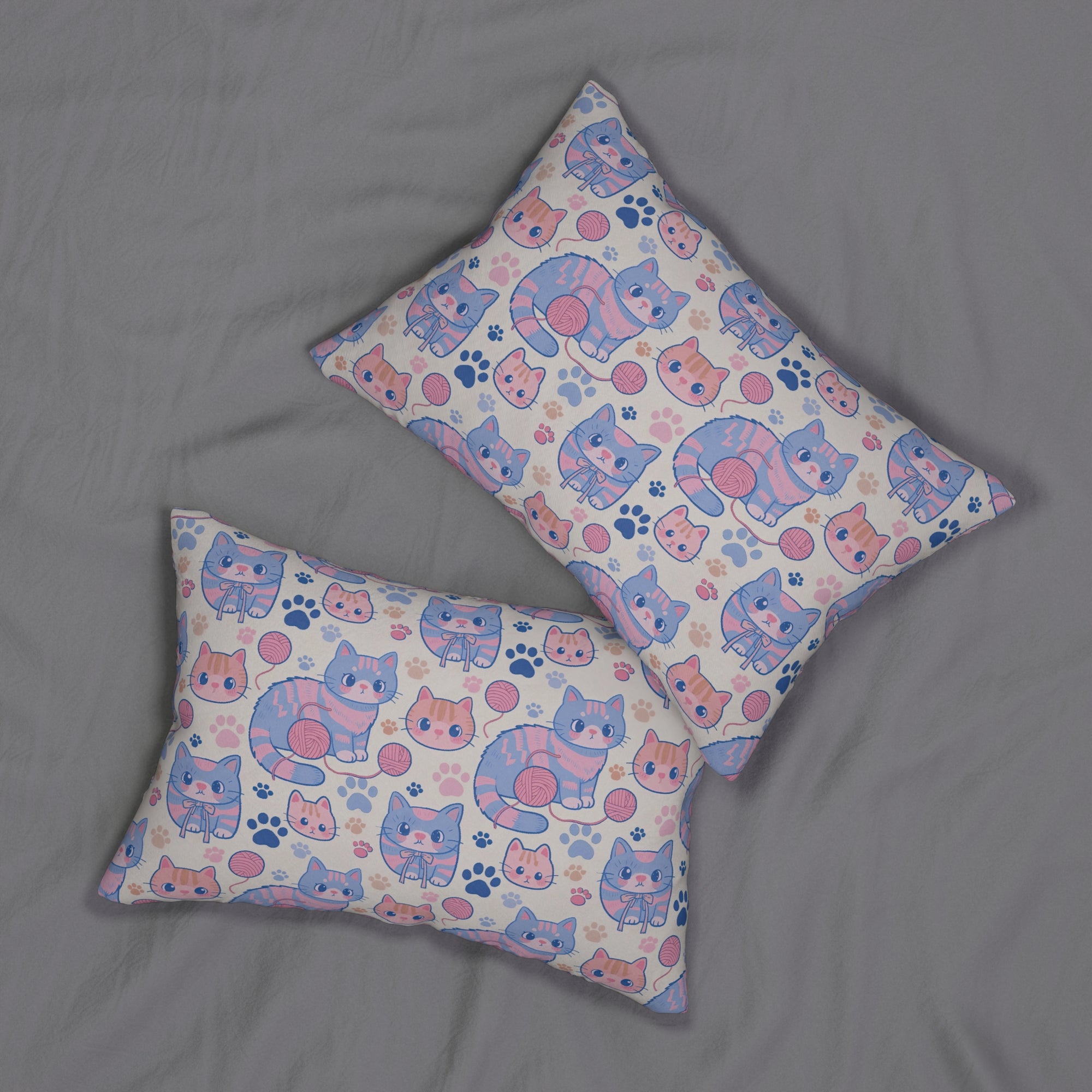 Indoor Lumbar Pillow - Sweet pastel blue and pink cartoon cats, cute kawaii style kittens with yarn and paw prints, charming and playful animal design, light cream background, delightful pet pattern