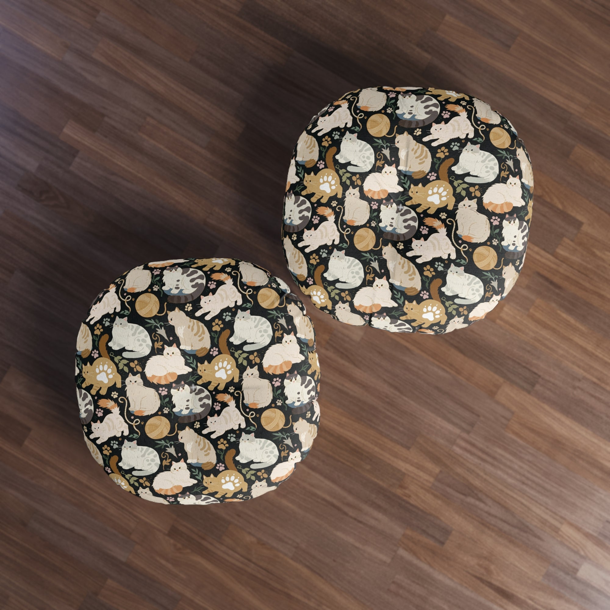 Indoor Round Floor Pillow - Diverse cats and kittens in a dark garden, various breeds and colors, soft natural tones with foliage and paw prints, charming animal illustration, dark background, gentle pet themed art