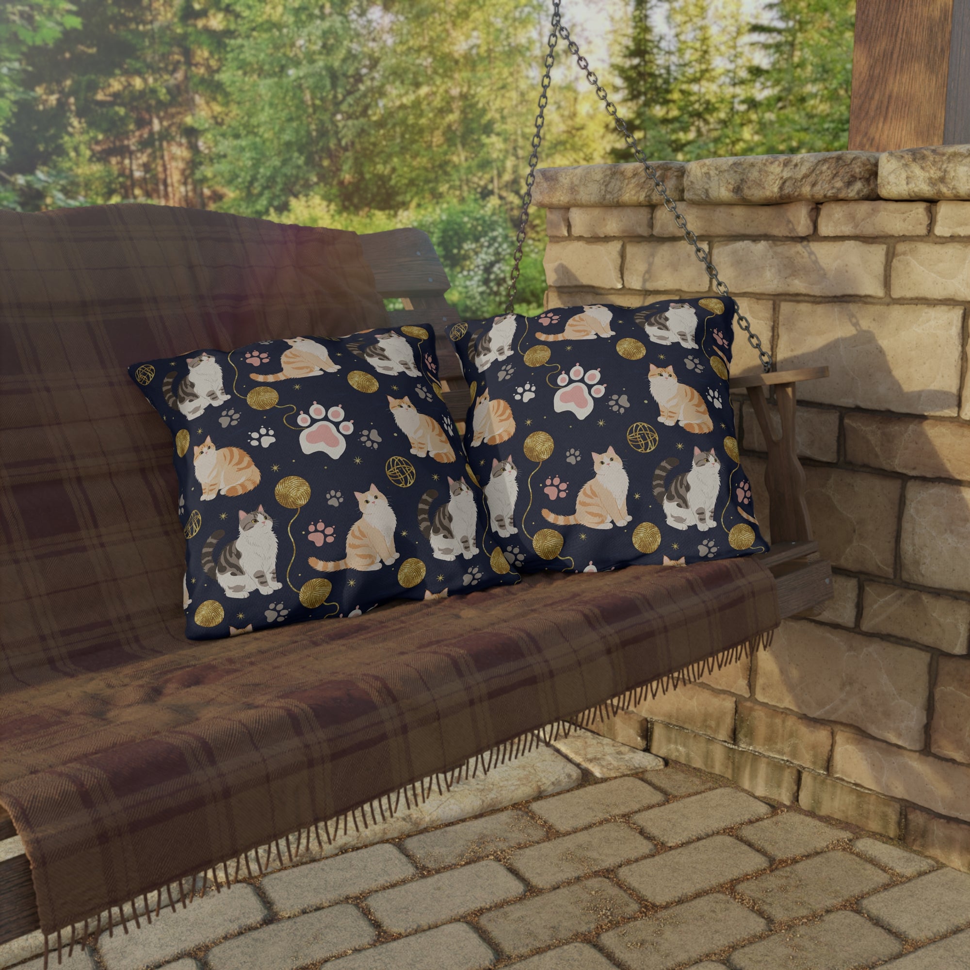 Outdoor Pillow - Charming cats and golden yarn playful design, cute kittens with paw prints, whimsical animal art for cat lovers, dark blue background, delightful pet themed illustration