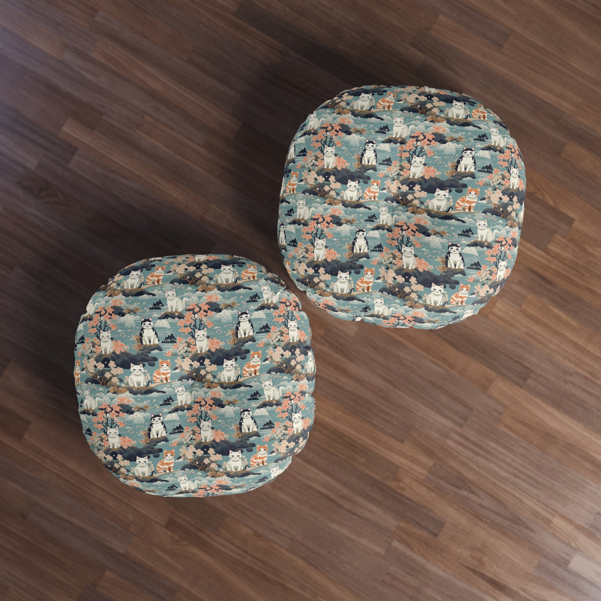 Indoor Round Floor Pillow - A serene watercolor painting of fluffy cats lounging on rocks, surrounded by cherry blossoms and blue water, in a tranquil, nature-filled, Japanese-inspired landscape.
