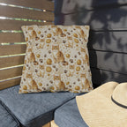 Outdoor Pillow - Adorable ginger cat with bright green eyes, sparkling gold yarn and paw prints, classic tabby cat illustration, cream background, cute and charming pet themed art