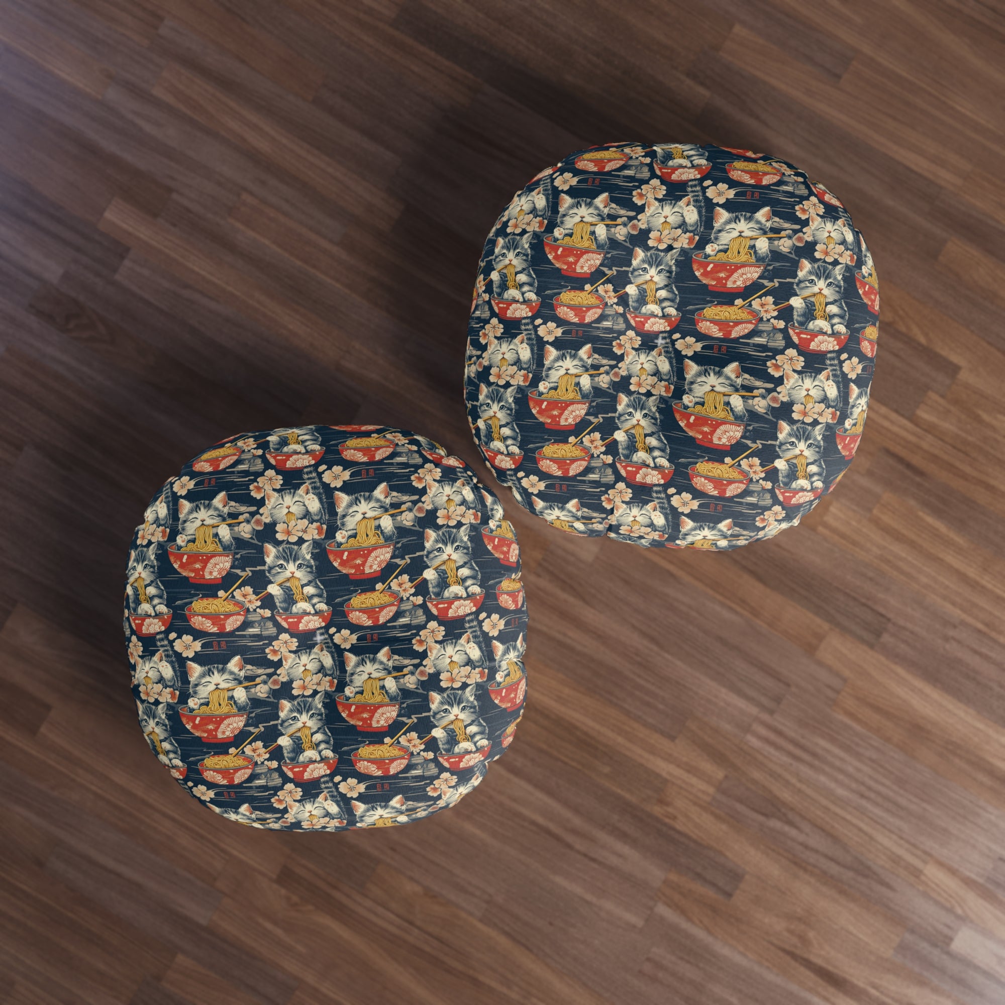 Indoor Round Floor Pillow - A charming and detailed illustration of happy kittens in red ramen bowls eating their noodles with chopsticks among beautiful pink cherry blossoms on a dark background.