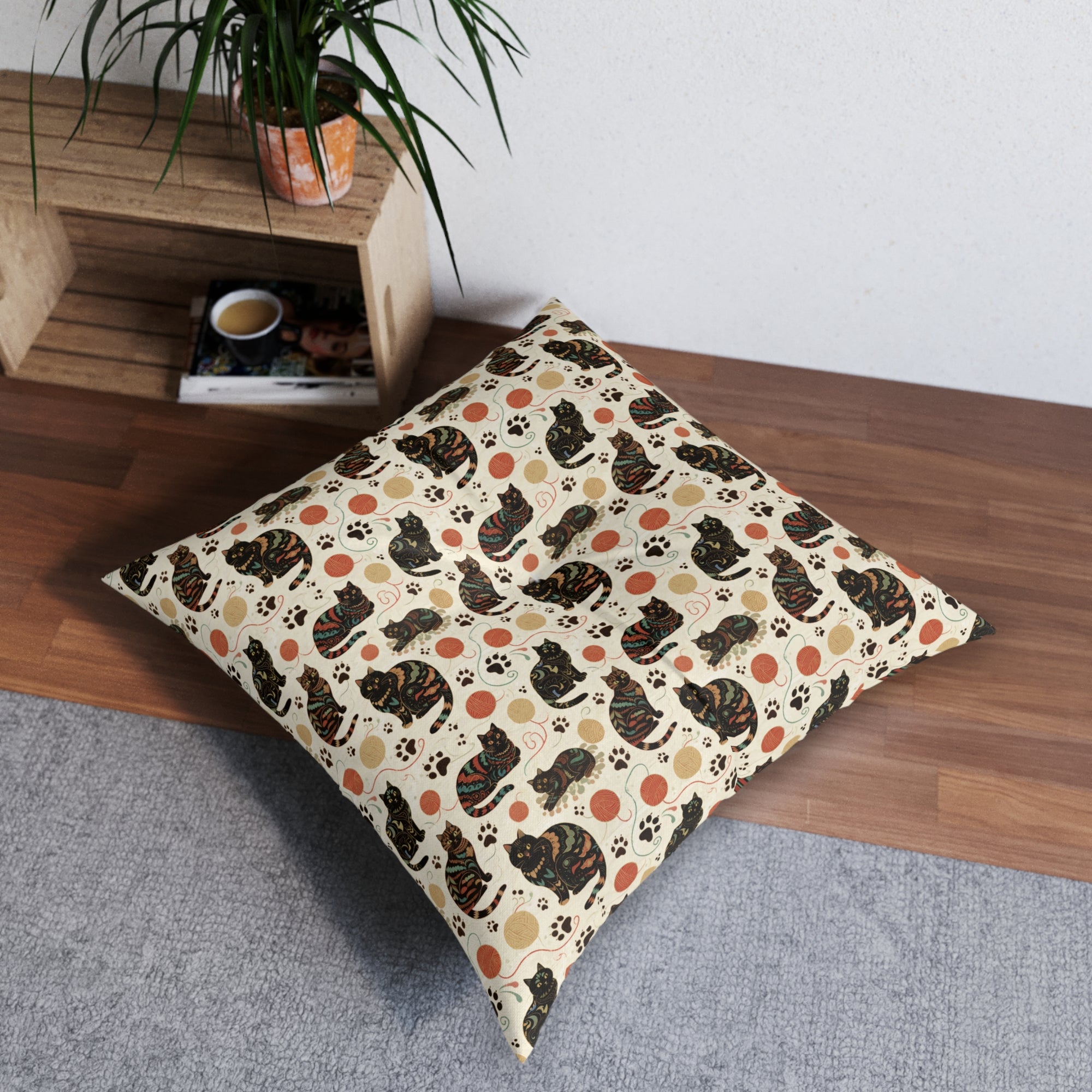 Indoor Square Floor Pillow - Intricate tribal patterned black cats, colorful folk art style, playful felines with yarn balls and paw prints, artistic and bohemian cat design, cream background, unique animal print