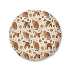 Indoor Round Floor Pillow - Artistic patterned cats in warm earth tones, unique tribal and folk art designs, playful felines with yarn and paw prints, bohemian animal print, cream background, creative cat art