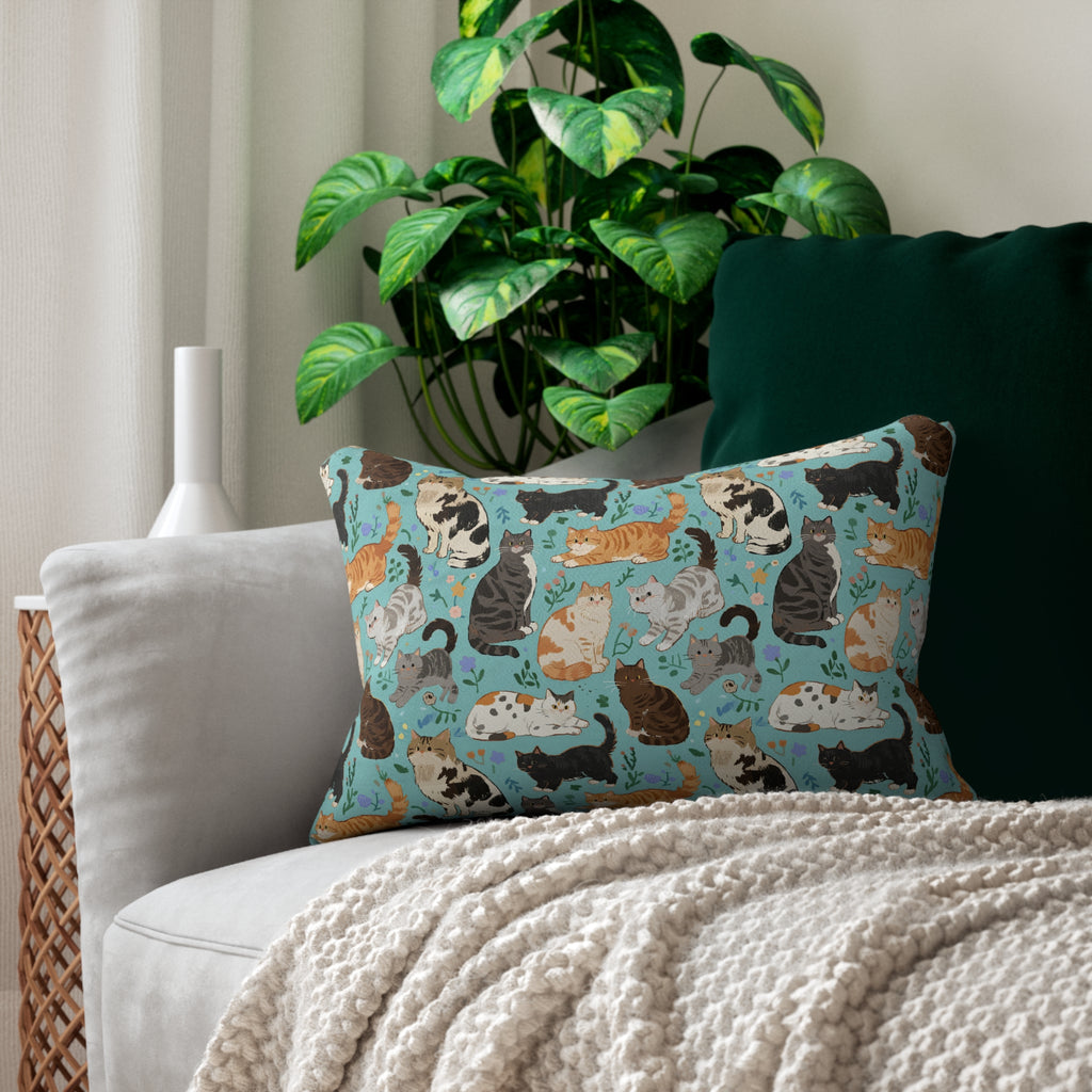 Indoor Lumbar Pillow - A Delightful Assortment of Charming Cats in Diverse Poses and Breeds Scattered Across a Soft Blue Floral Background