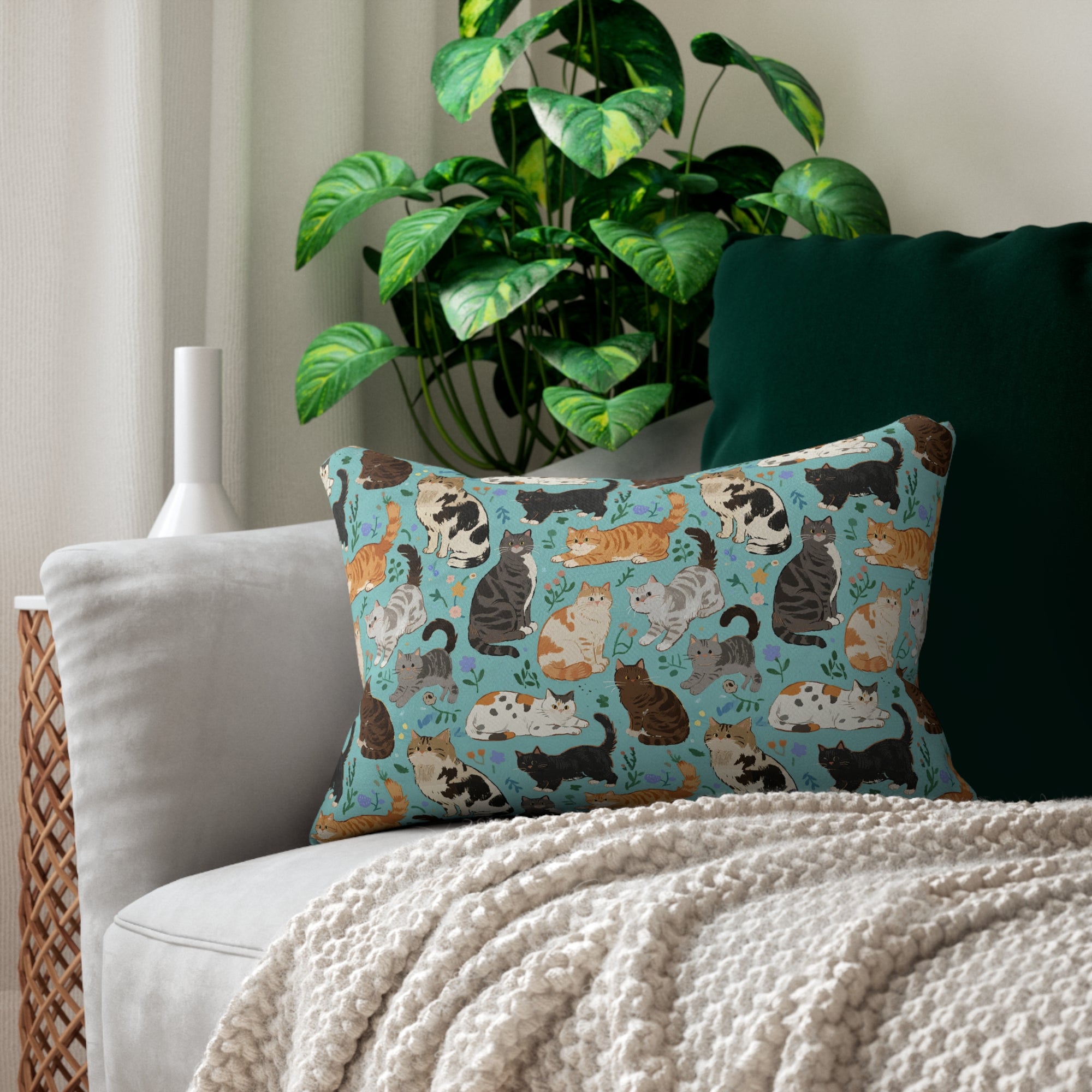 Indoor Lumbar Pillow - A Delightful Assortment of Charming Cats in Diverse Poses and Breeds Scattered Across a Soft Blue Floral Background
