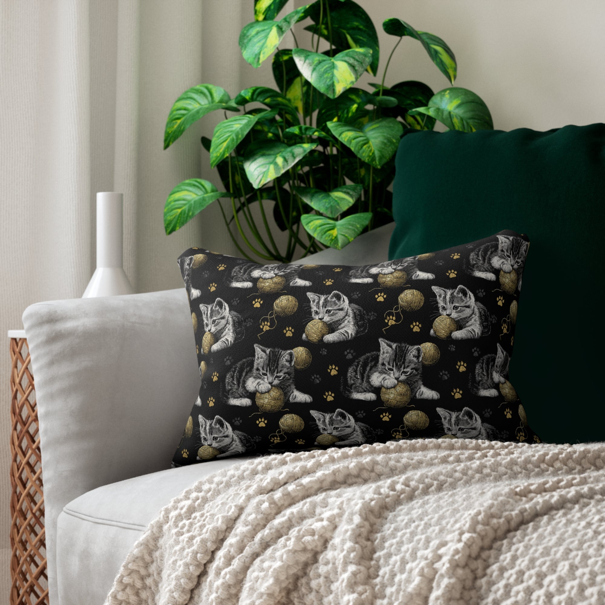 Indoor Lumbar Pillow - Grey and White Kittens Playing with Golden Yarn on a Black Background with Paw Prints