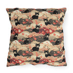 Outdoor Pillow - A whimsical and enchanting Japanese-style pattern featuring cute black and orange cats nestled among vibrant orange blossoms and soft, cloudy backgrounds.