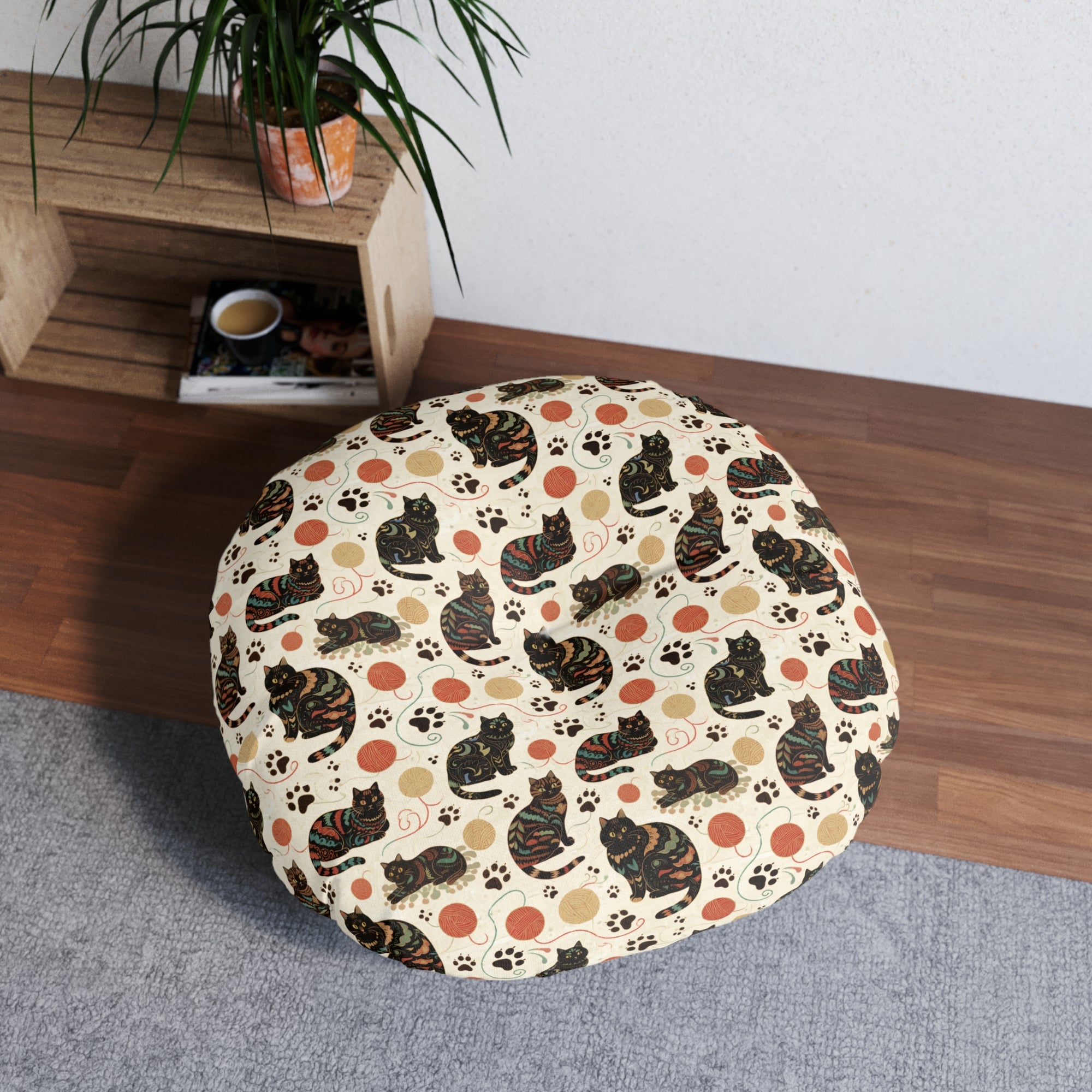 Indoor Round Floor Pillow - Intricate tribal patterned black cats, colorful folk art style, playful felines with yarn balls and paw prints, artistic and bohemian cat design, cream background, unique animal print