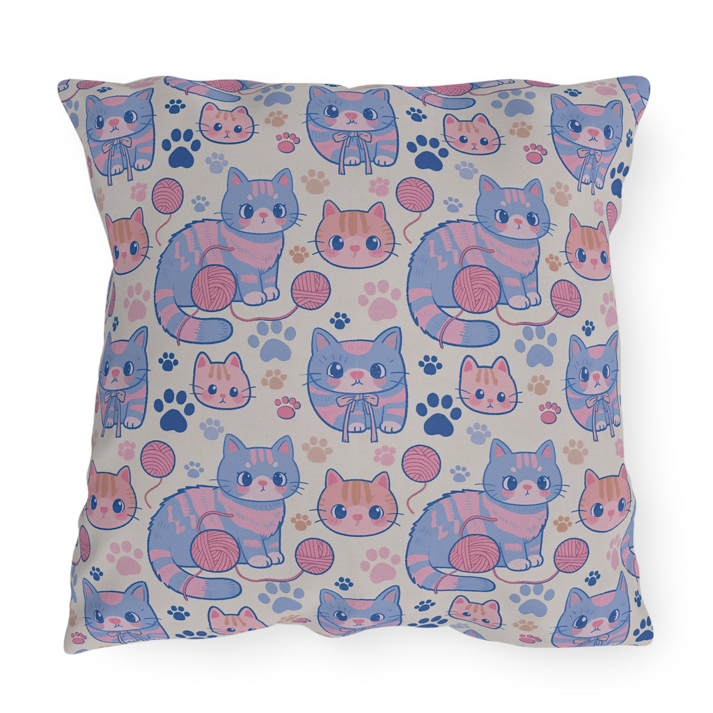 Outdoor Pillow - Sweet pastel blue and pink cartoon cats, cute kawaii style kittens with yarn and paw prints, charming and playful animal design, light cream background, delightful pet pattern