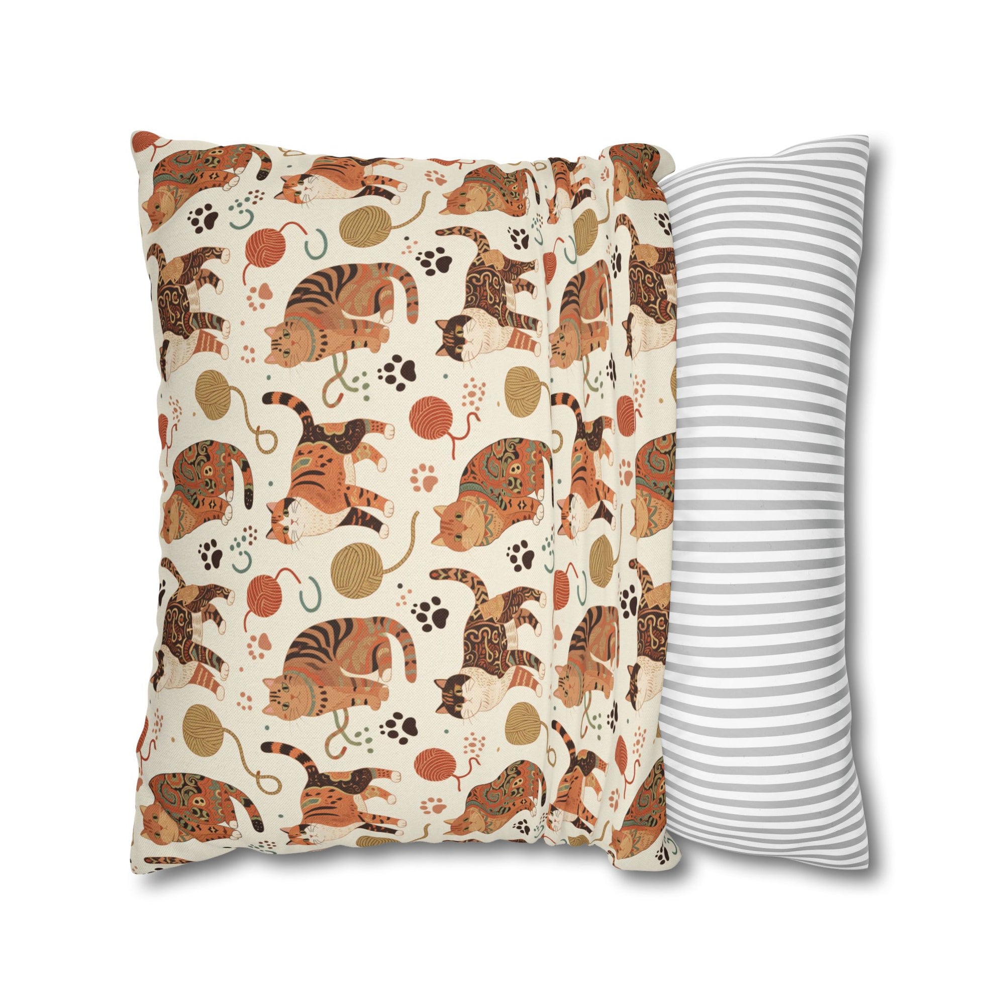 Square Pillowcase - Artistic patterned cats in warm earth tones, unique tribal and folk art designs, playful felines with yarn and paw prints, bohemian animal print, cream background, creative cat art