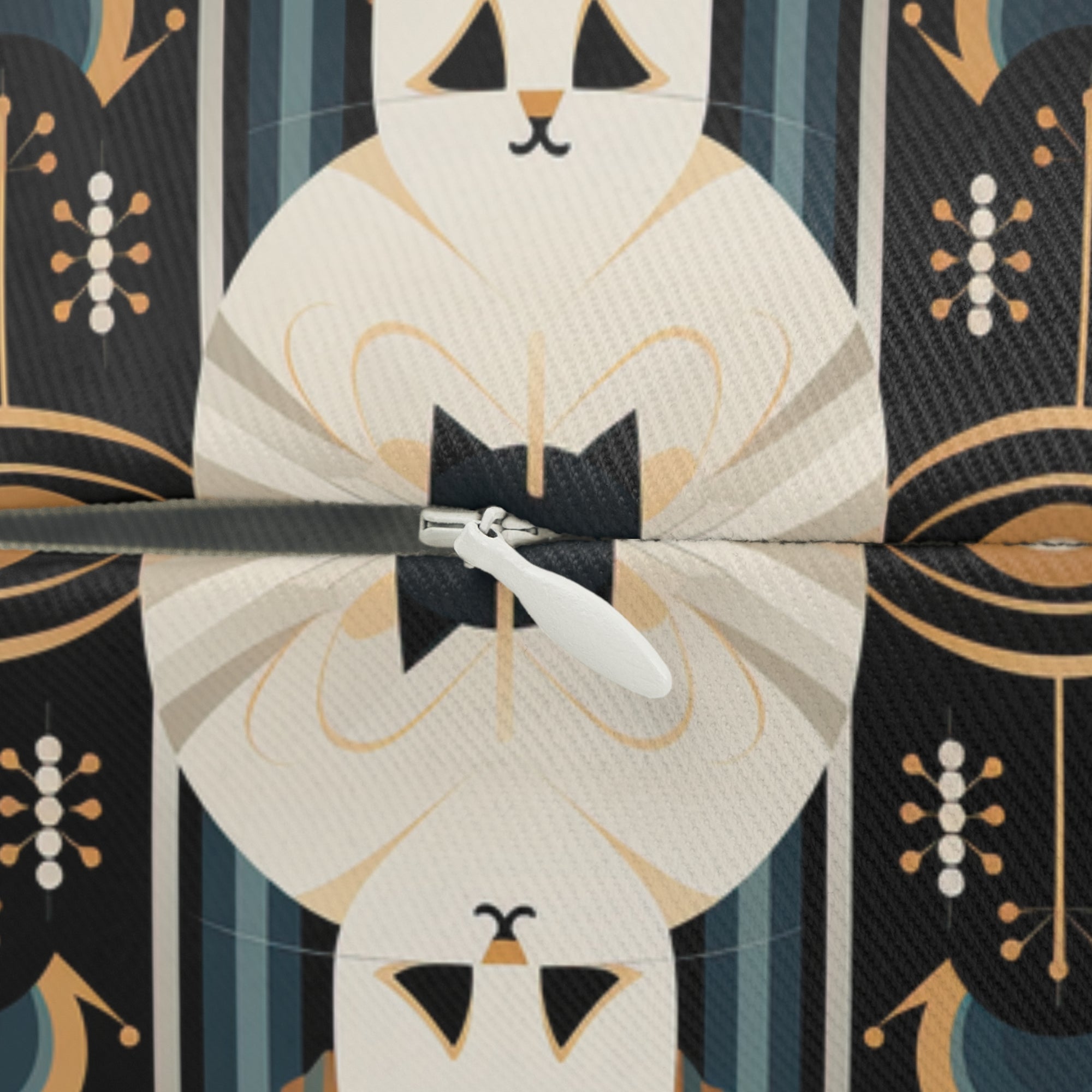 Indoor Lumbar Pillow - An elegant and artistic Art Deco-style pattern featuring streamlined white cats with a striking geometric backdrop of golden and black lines and shapes.