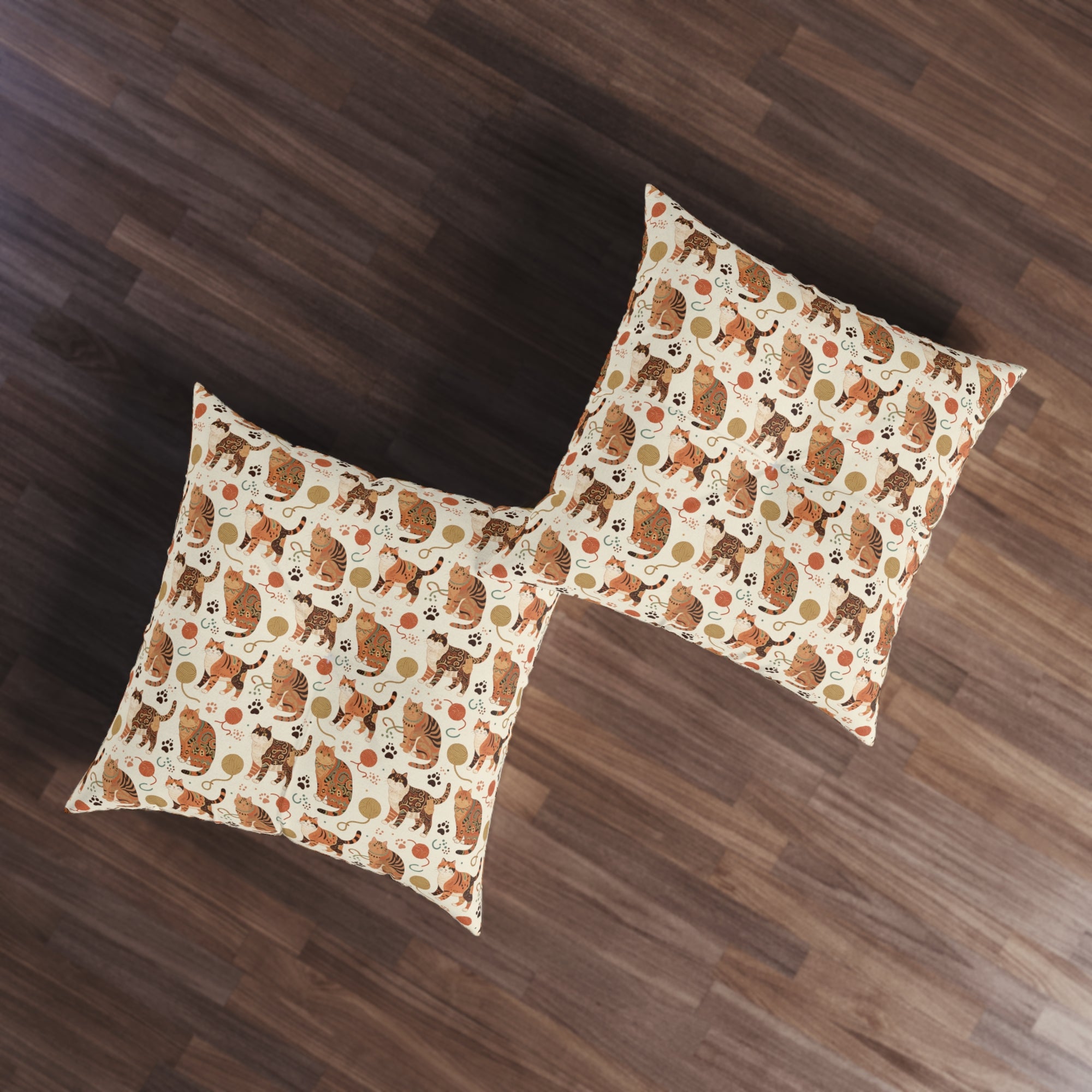 Indoor Square Floor Pillow - Artistic patterned cats in warm earth tones, unique tribal and folk art designs, playful felines with yarn and paw prints, bohemian animal print, cream background, creative cat art