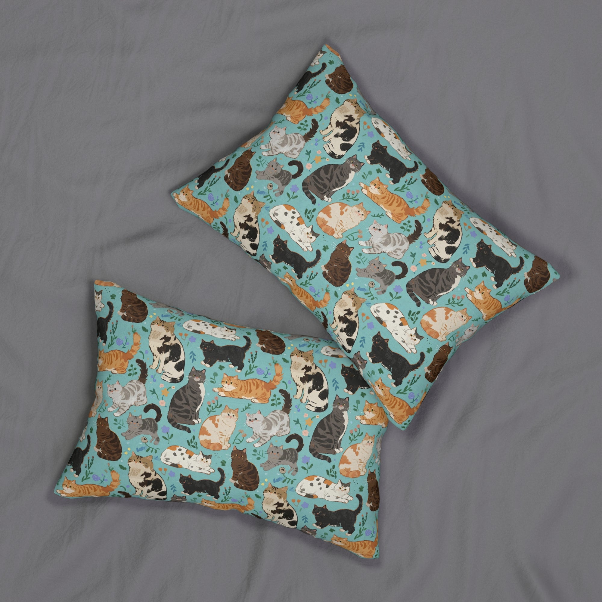 Indoor Lumbar Pillow - A Delightful Assortment of Charming Cats in Diverse Poses and Breeds Scattered Across a Soft Blue Floral Background