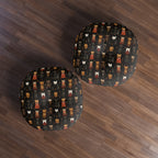 Indoor Round Floor Pillow - A striking and sophisticated Art Deco-style pattern of felines with bold, intricate lines and dramatic geometric shapes, all rendered in a unique gold and gray color palette.