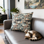 Indoor Square Pillow - A serene watercolor painting of fluffy cats lounging on rocks, surrounded by cherry blossoms and blue water, in a tranquil, nature-filled, Japanese-inspired landscape.