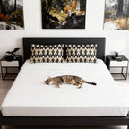 Pillow Sham - An elegant and artistic Art Deco-style pattern featuring streamlined white cats with a striking geometric backdrop of golden and black lines and shapes.